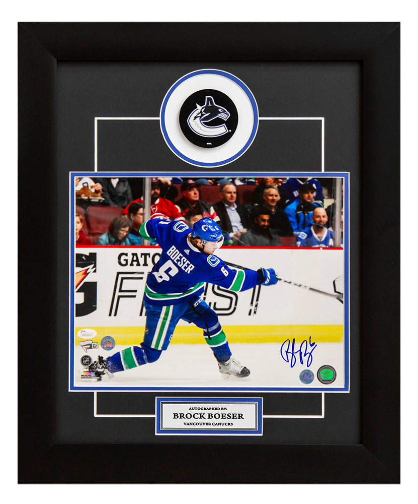 Brock Boeser Vancouver Canucks Autographed Slapshot 20x24 Puck Frame product image 1, provided for visual reference and