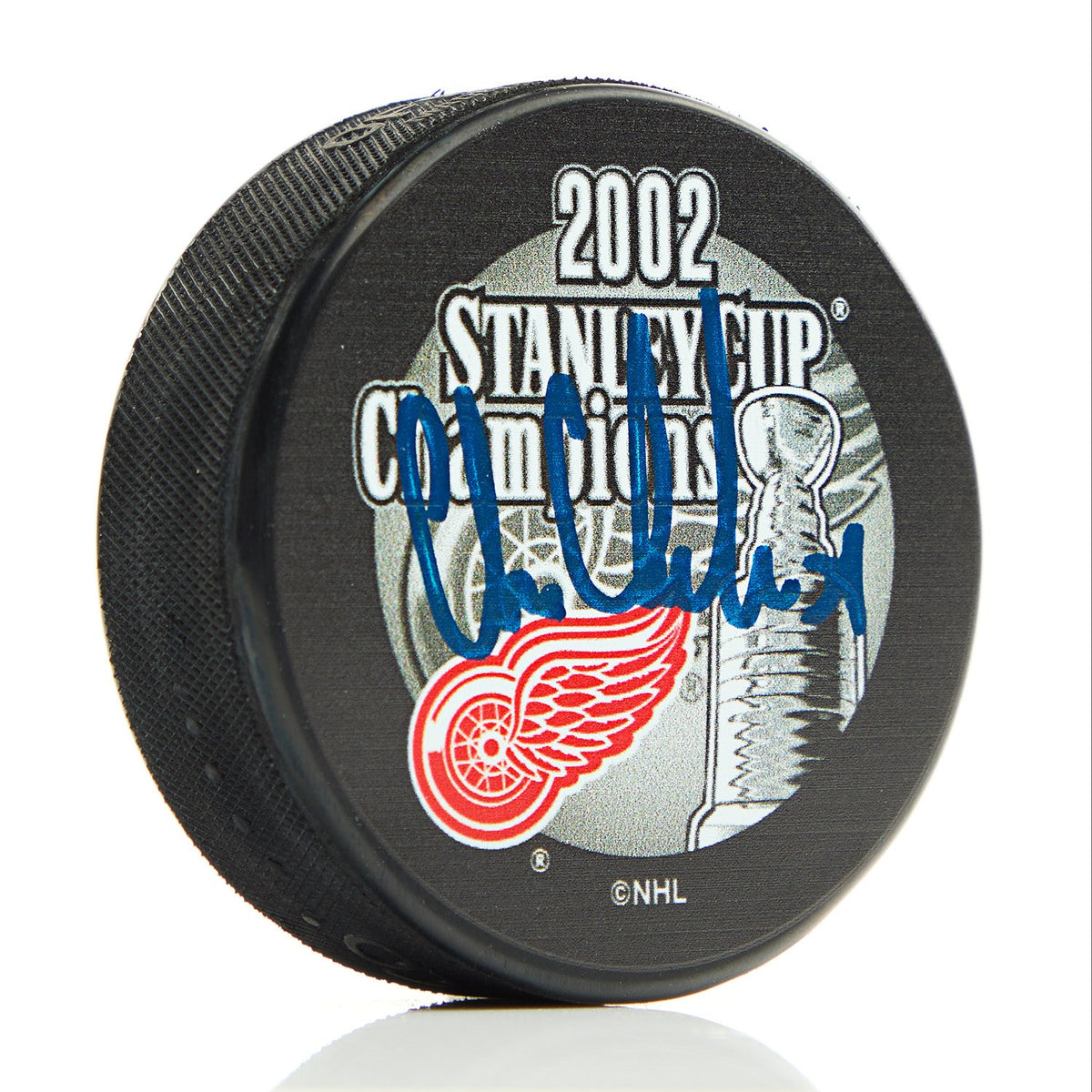 Chris Chelios Signed Detroit Red Wings 2002 Stanley Cup Puck product image 1, provided for visual reference and product