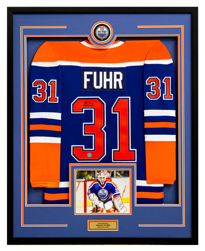 Grant Fuhr Signed Edmonton Oilers Puck Logo 36x44 Jersey Frame product image 1, provided for visual reference and product