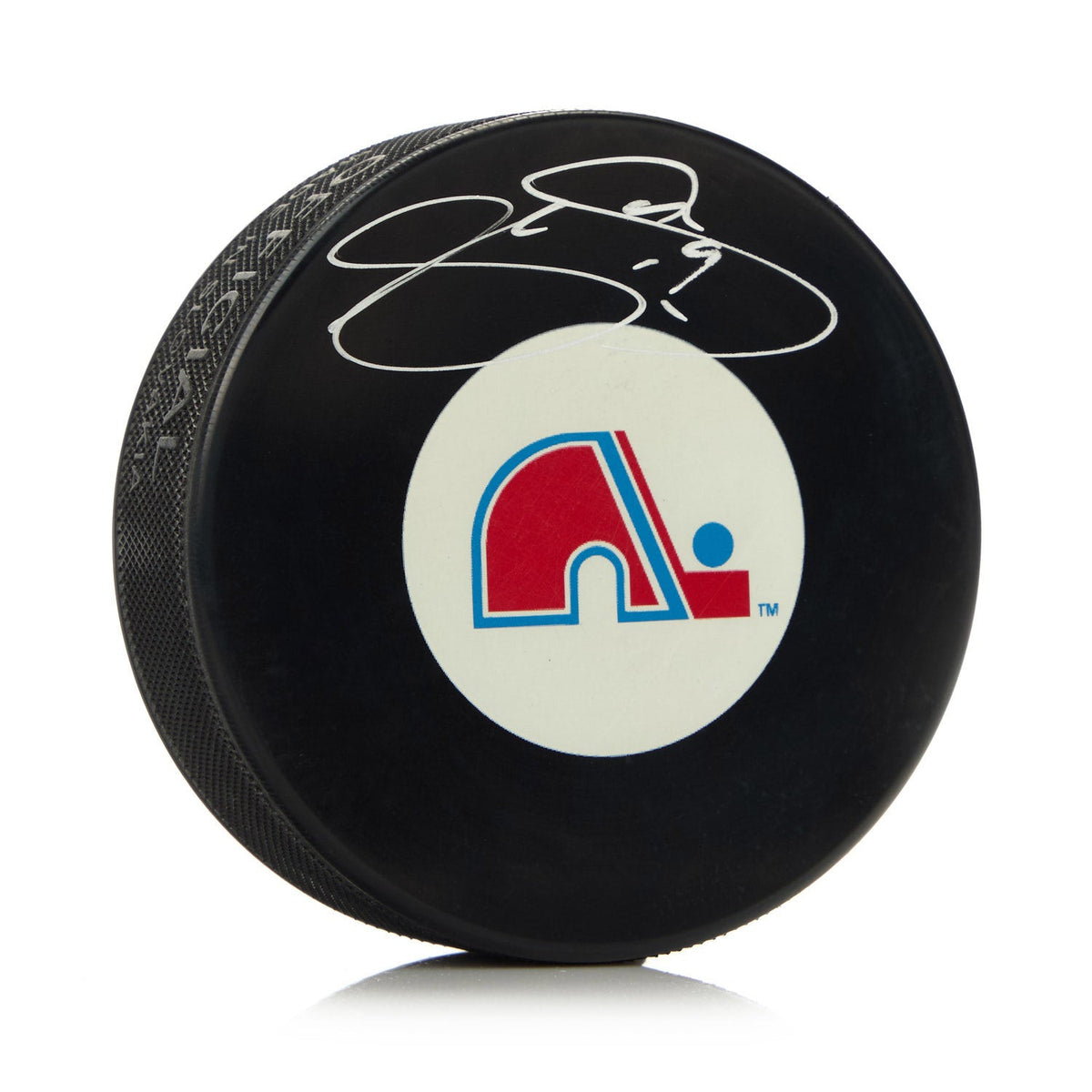 Joe Sakic Autographed Quebec Nordiques Retro Logo Puck product image 1, provided for visual reference and product detail