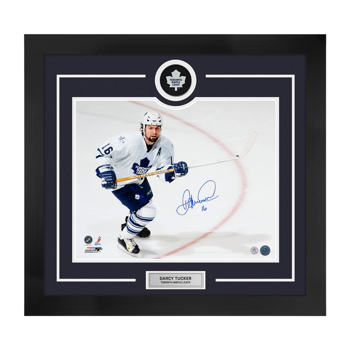 Darcy Tucker Autographed Toronto Maple Leafs Puck Logo 28x30 Frame product image 1, provided for visual reference and