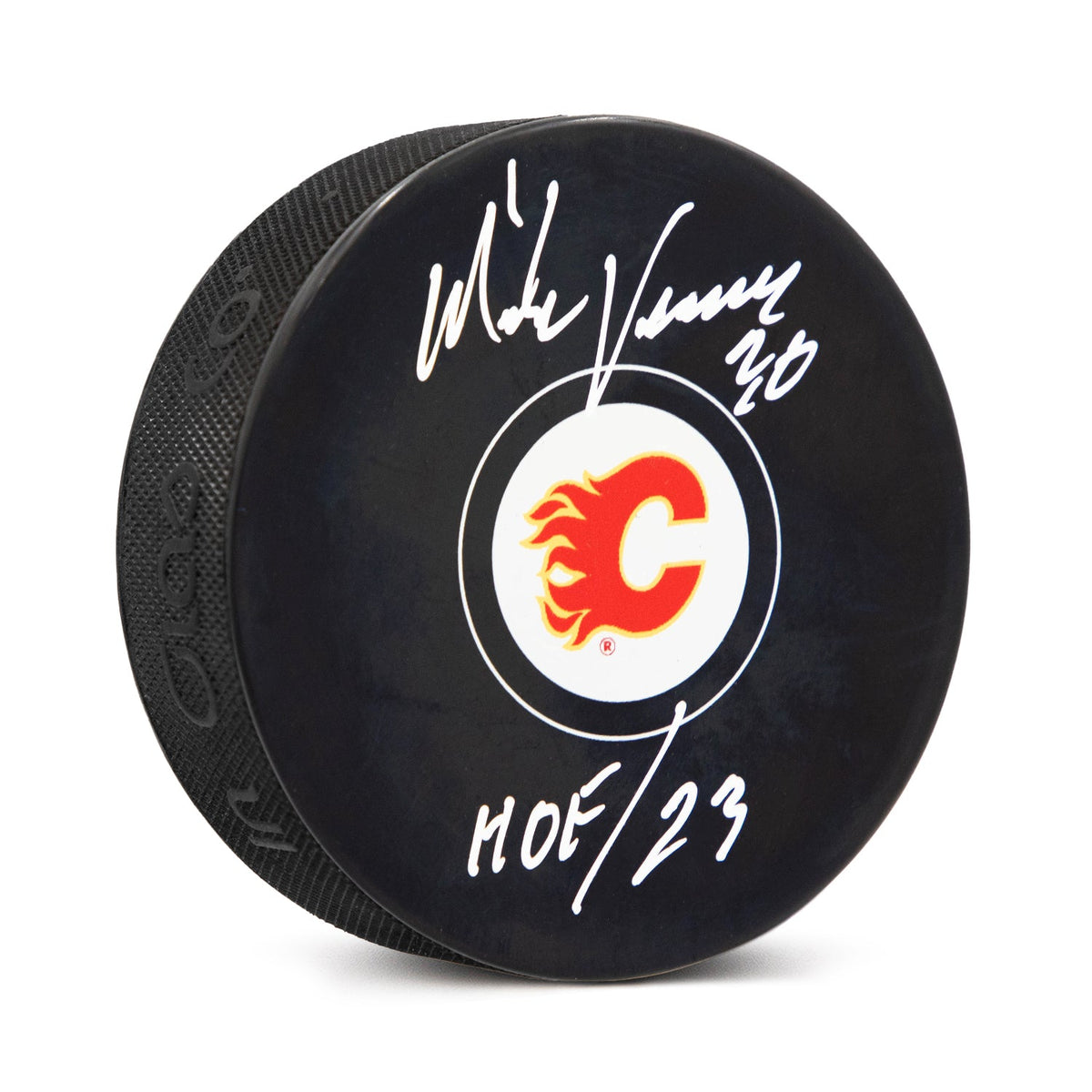 Mike Vernon Autographed Calgary Flames Hockey Puck with HOF Note product image 1, provided for visual reference and product