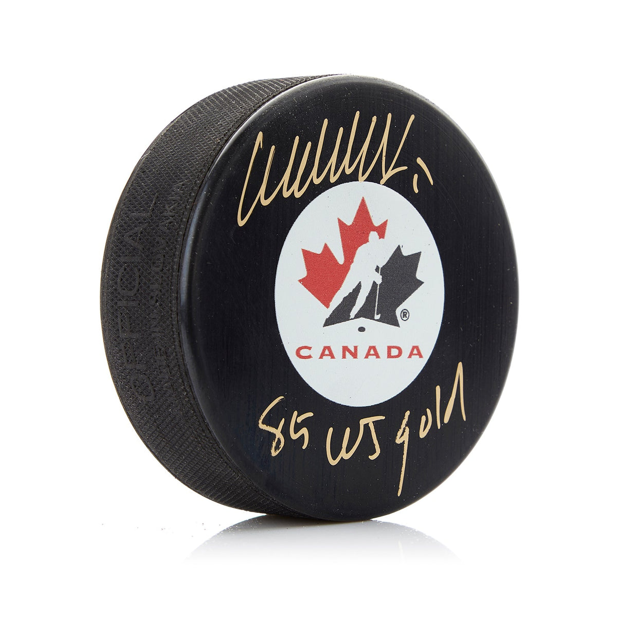 Wendel Clark Signed Team Canada Puck with JR Gold Note product image 1, provided for visual reference and product detail