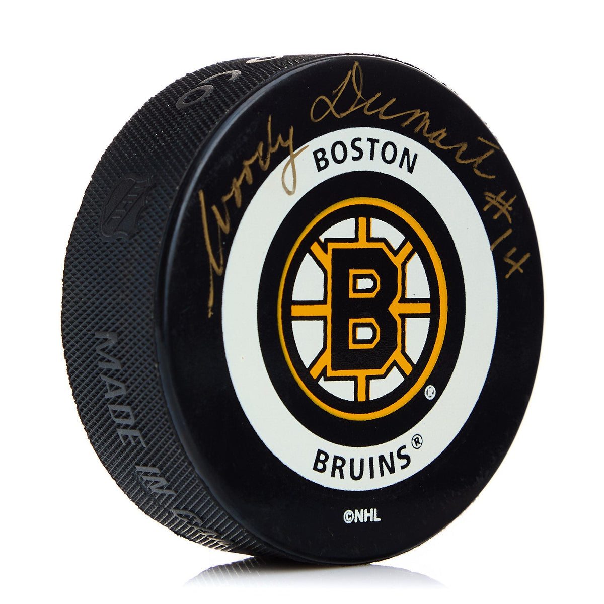 Woody Dumart Boston Bruins Autographed Hockey Puck product image 1, provided for visual reference and product detail review