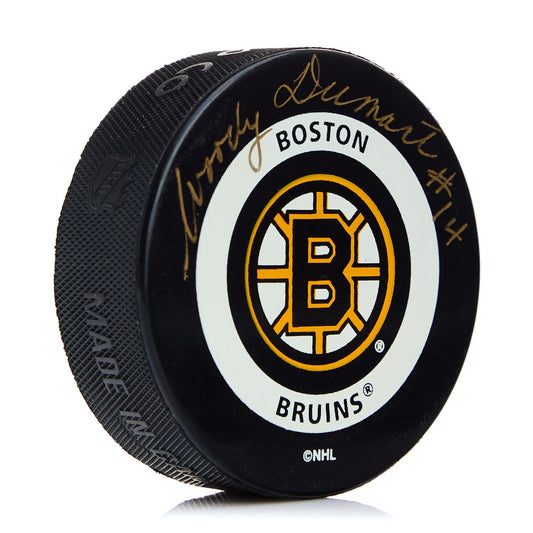 Woody Dumart Boston Bruins Autographed Hockey Puck product image 1, provided for visual reference and product detail review