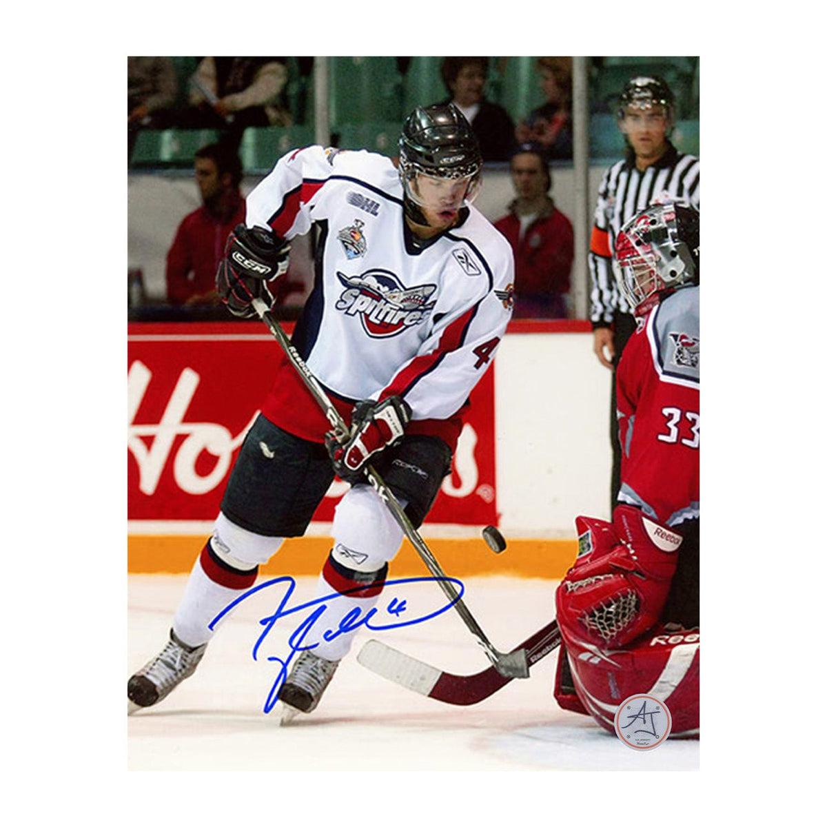 Taylor Hall Autographed Windsor Spitfires Game Action 8x10 Photo product image 1, provided for visual reference and product
