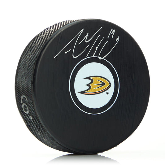 Adam Henrique Autographed Anaheim Ducks Hockey Puck product image 1, provided for visual reference and product detail review
