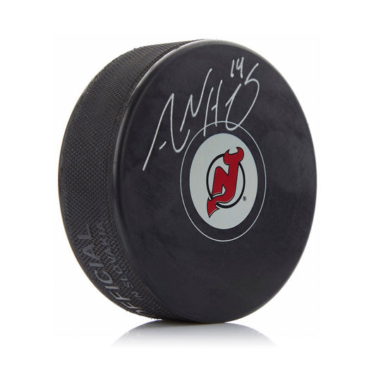Adam Henrique Autographed New Jersey Devils Hockey Puck product image 1, provided for visual reference and product detail