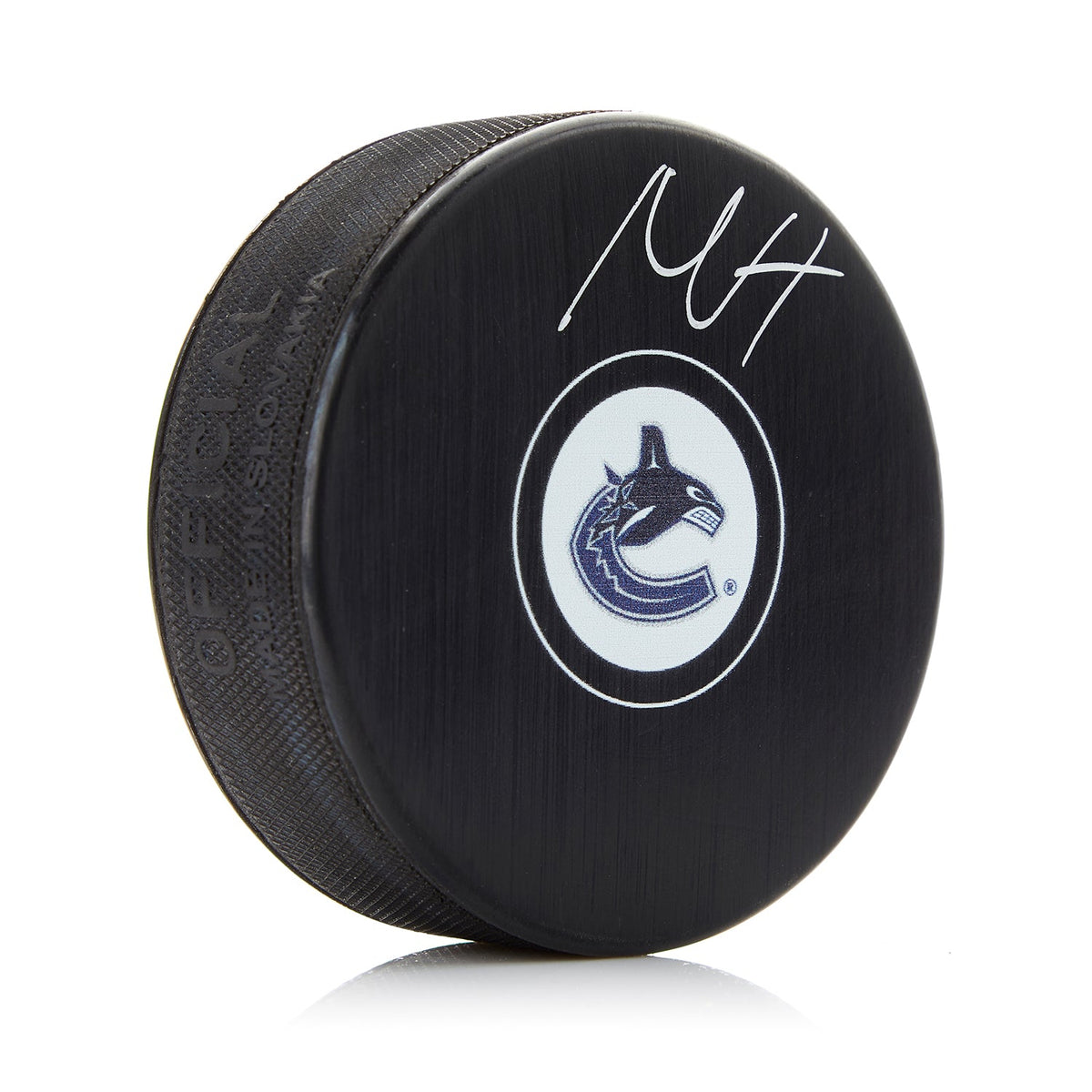 Nils Hoglander Vancouver Canucks Autographed Hockey Puck product image 1, provided for visual reference and product detail