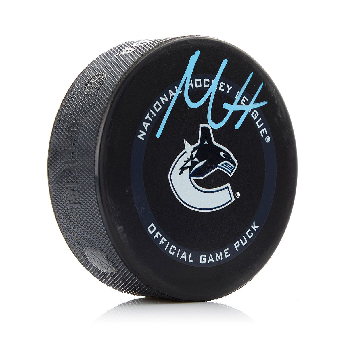 Nils Hoglander Vancouver Canucks Signed Official Game Puck product image 1, provided for visual reference and product detail