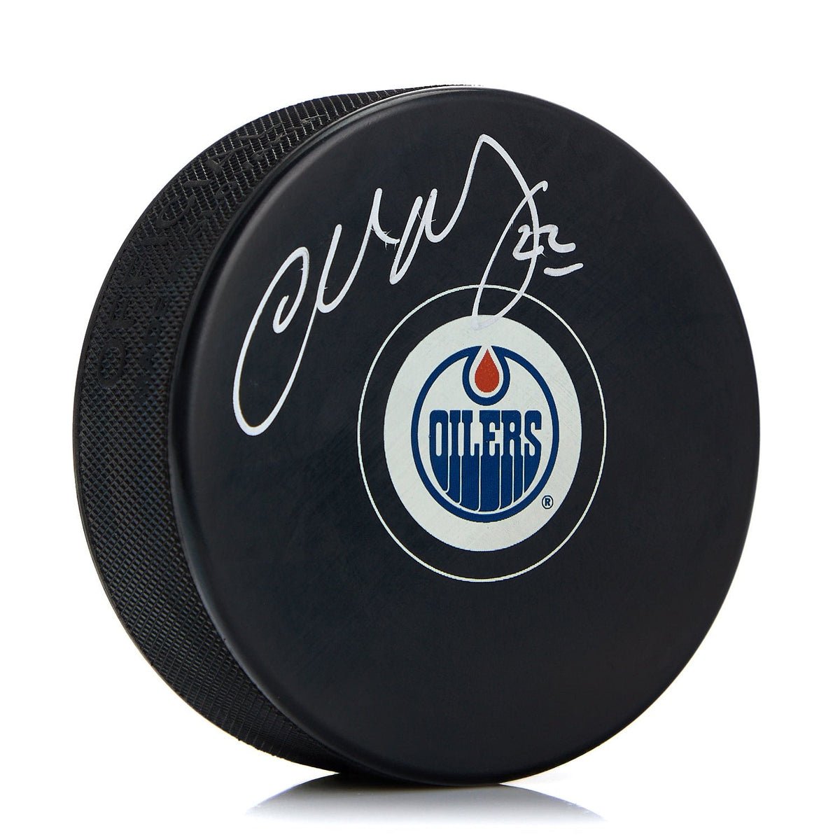 Charlie Huddy Edmonton Oilers Autographed Hockey Puck product image 1, provided for visual reference and product detail