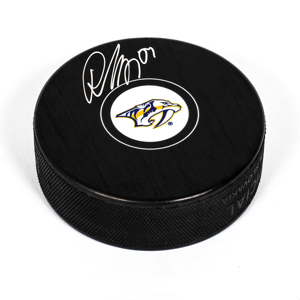 Roman Josi Nashville Predators Autographed Hockey Puck product image 1, provided for visual reference and product detail