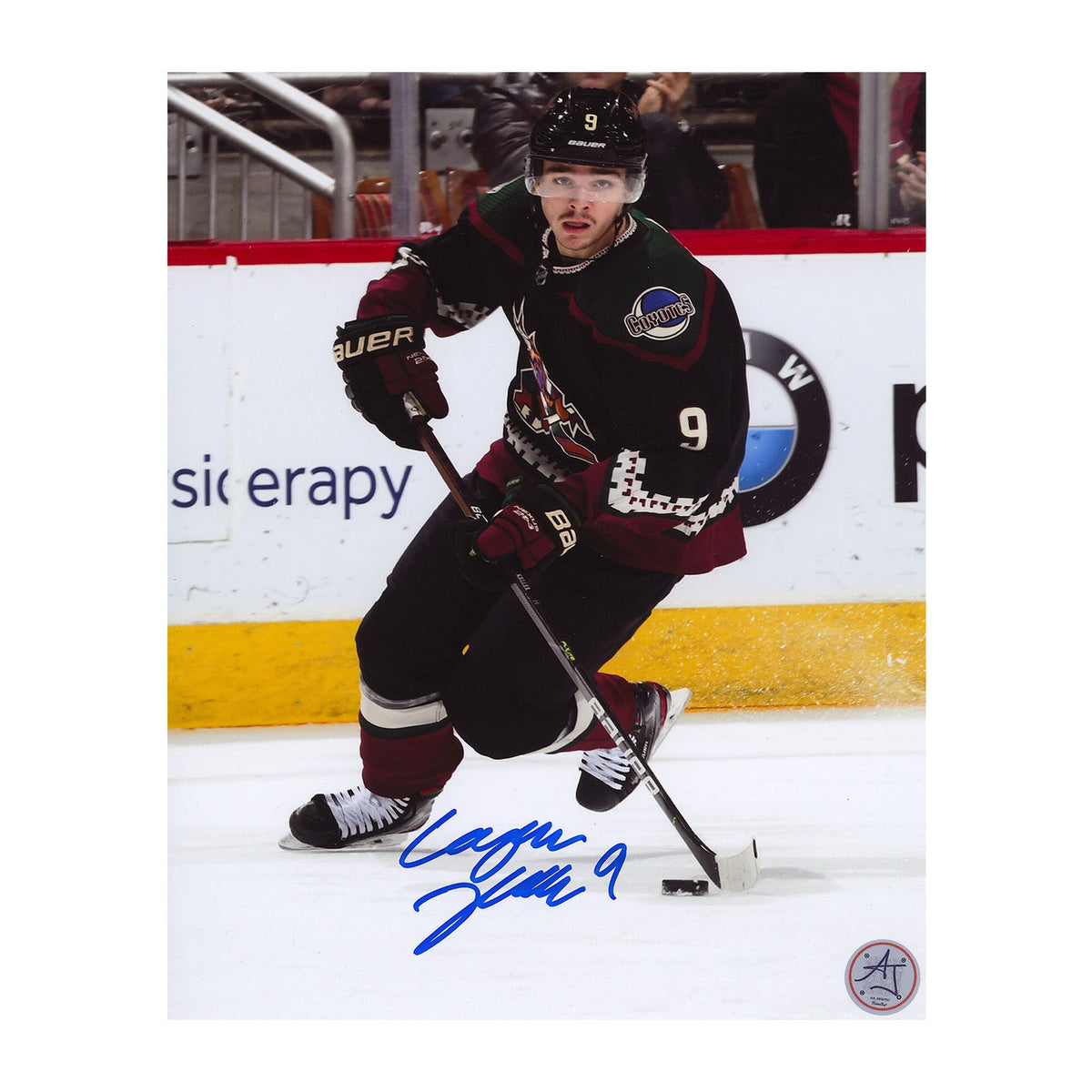 Clayton Keller Signed Arizona Coyotes Puck Rush 8x10 Photo product image 1, provided for visual reference and product detail