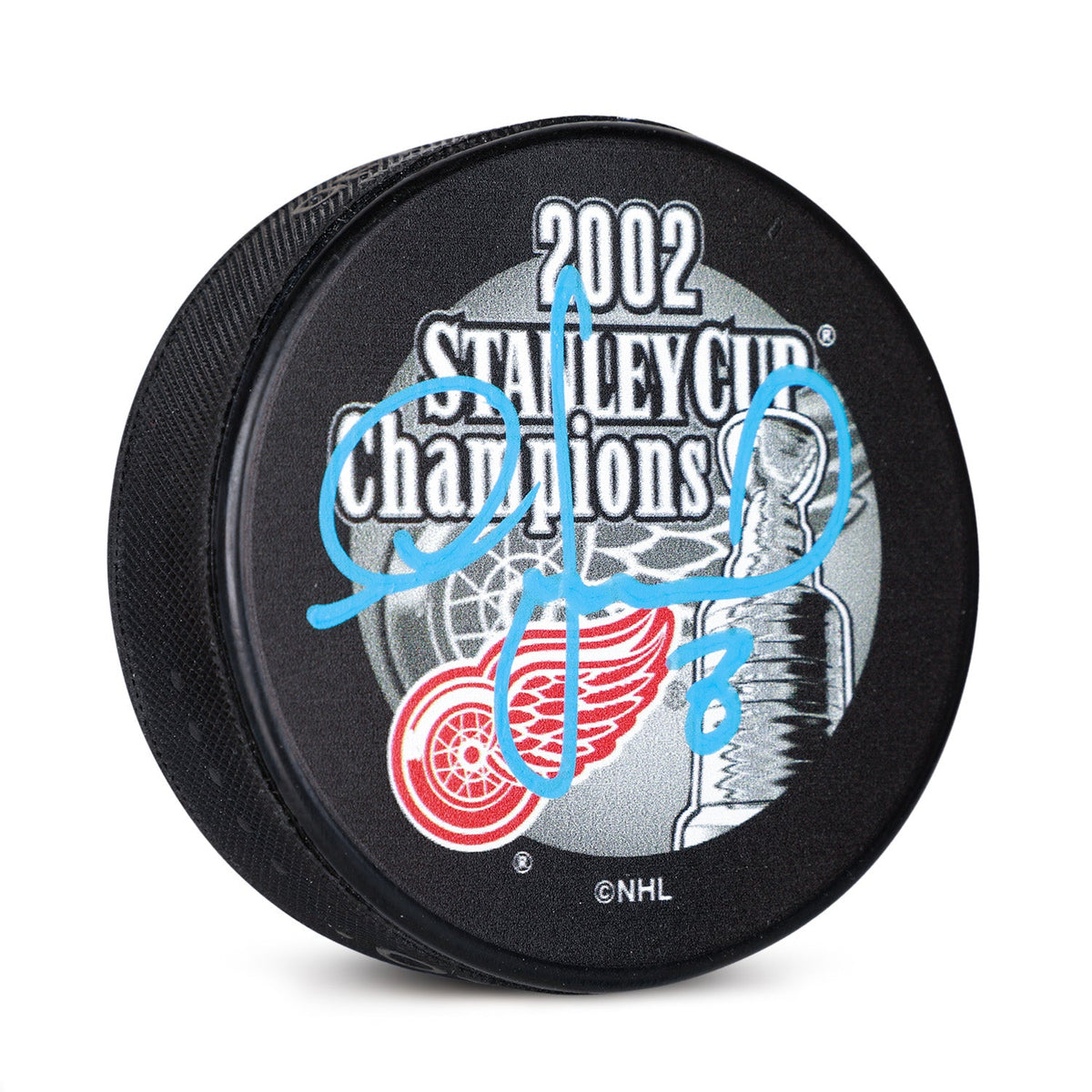 Igor Larionov Signed Detroit Red Wings 2002 Stanley Cup Champions Puck product image 1, provided for visual reference and