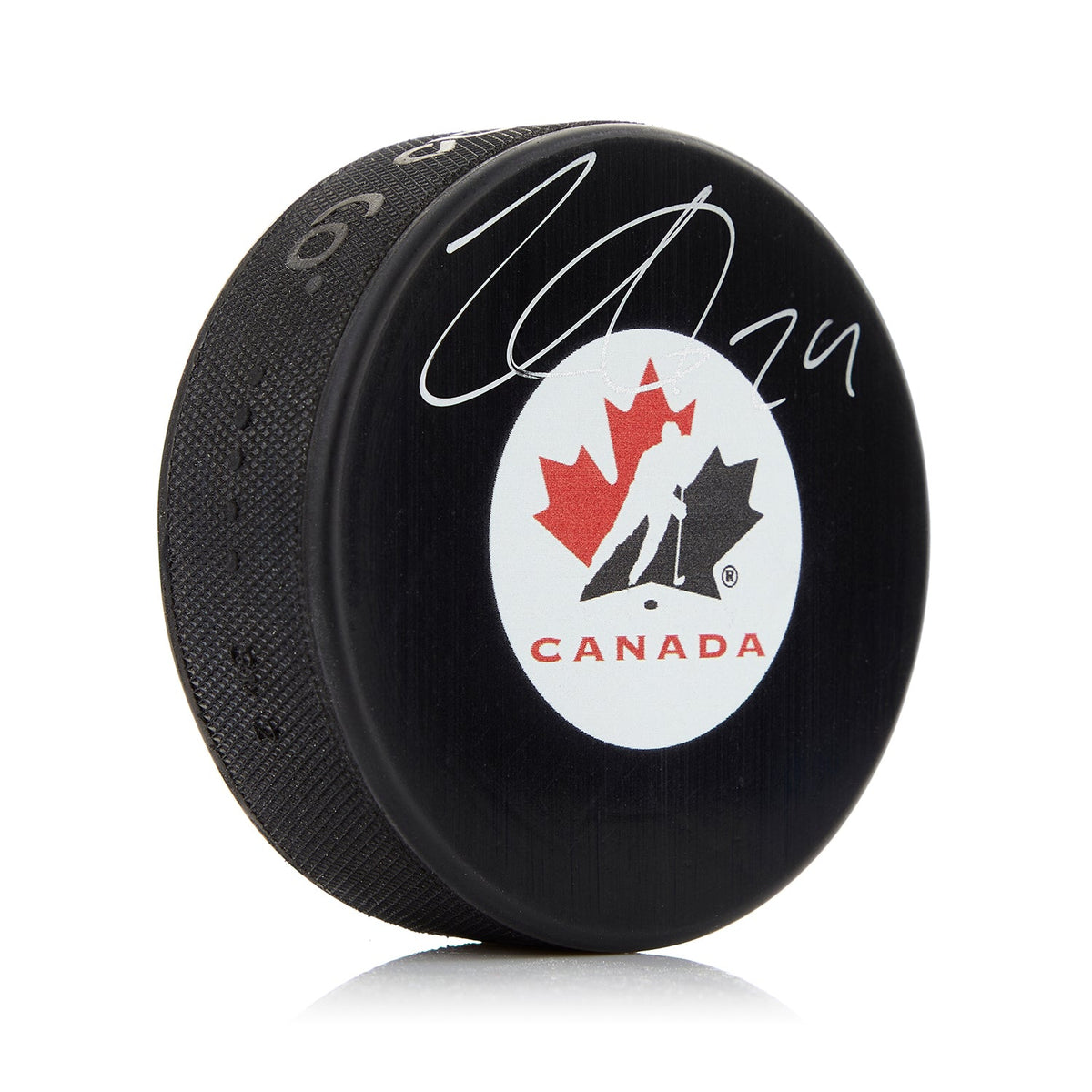 Nathan MacKinnon Team Canada Autographed Hockey Puck product image 1, provided for visual reference and product detail review