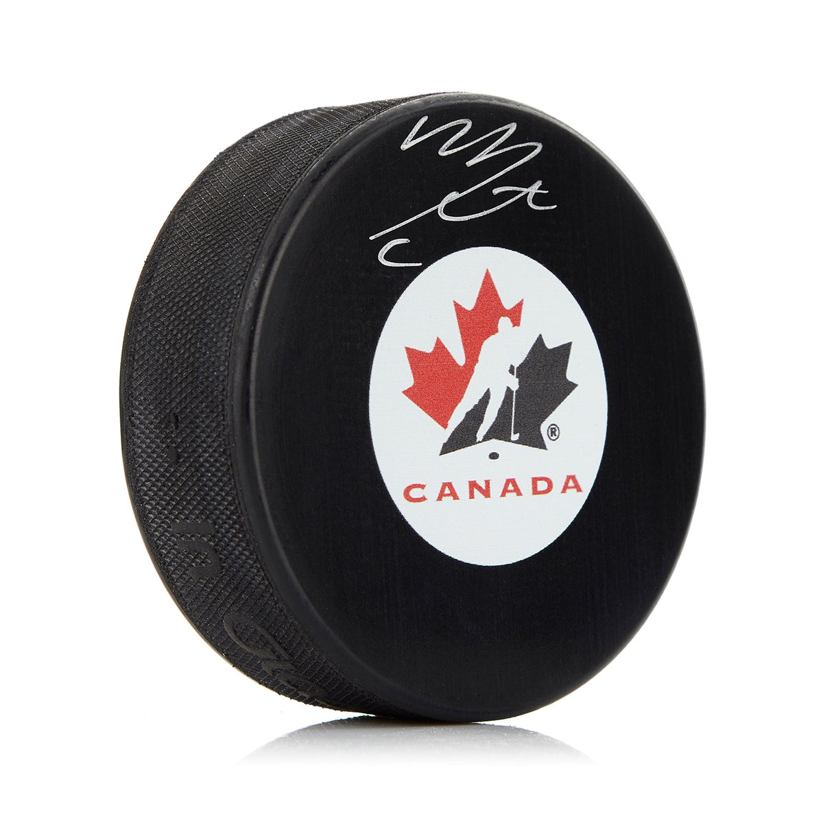 Mitch Marner Autographed Team Canada Hockey Puck product image 1, provided for visual reference and product detail review