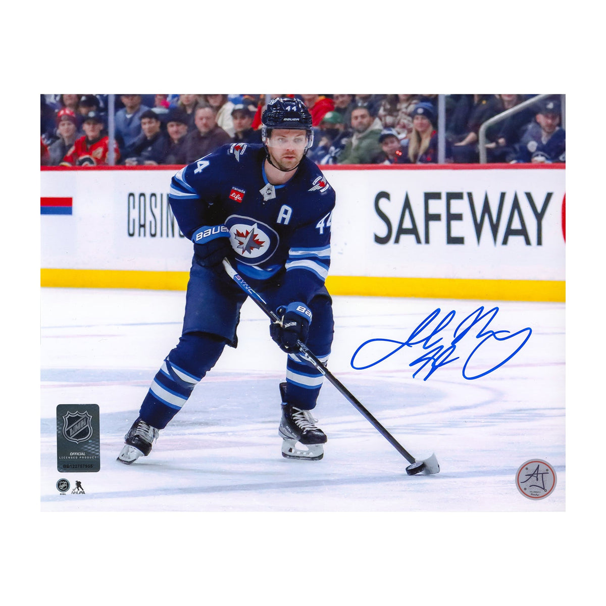 Josh Morrissey Signed Winnipeg Jets Puck Rush 8x10 Photo product image 1, provided for visual reference and product detail