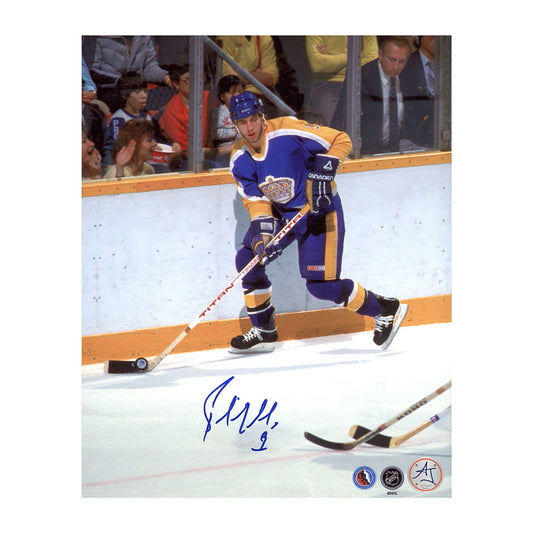 Bernie Nicholls Signed Los Angeles Kings Puck Rush 8x10 Photo product image 1, provided for visual reference and product