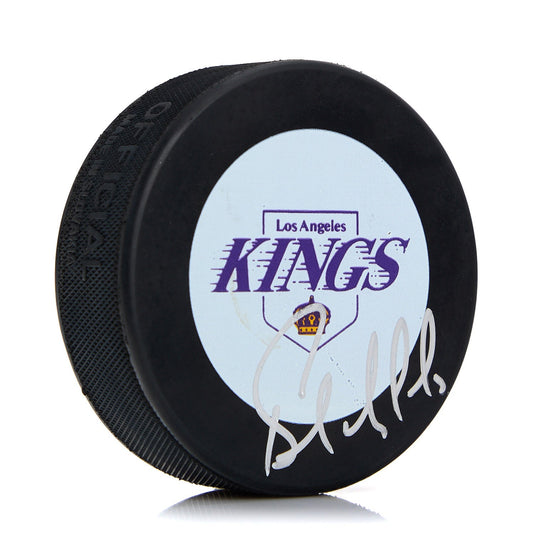 Bernie Nicholls Los Angeles Kings Autographed Purple Logo Hockey Puck product image 1, provided for visual reference and