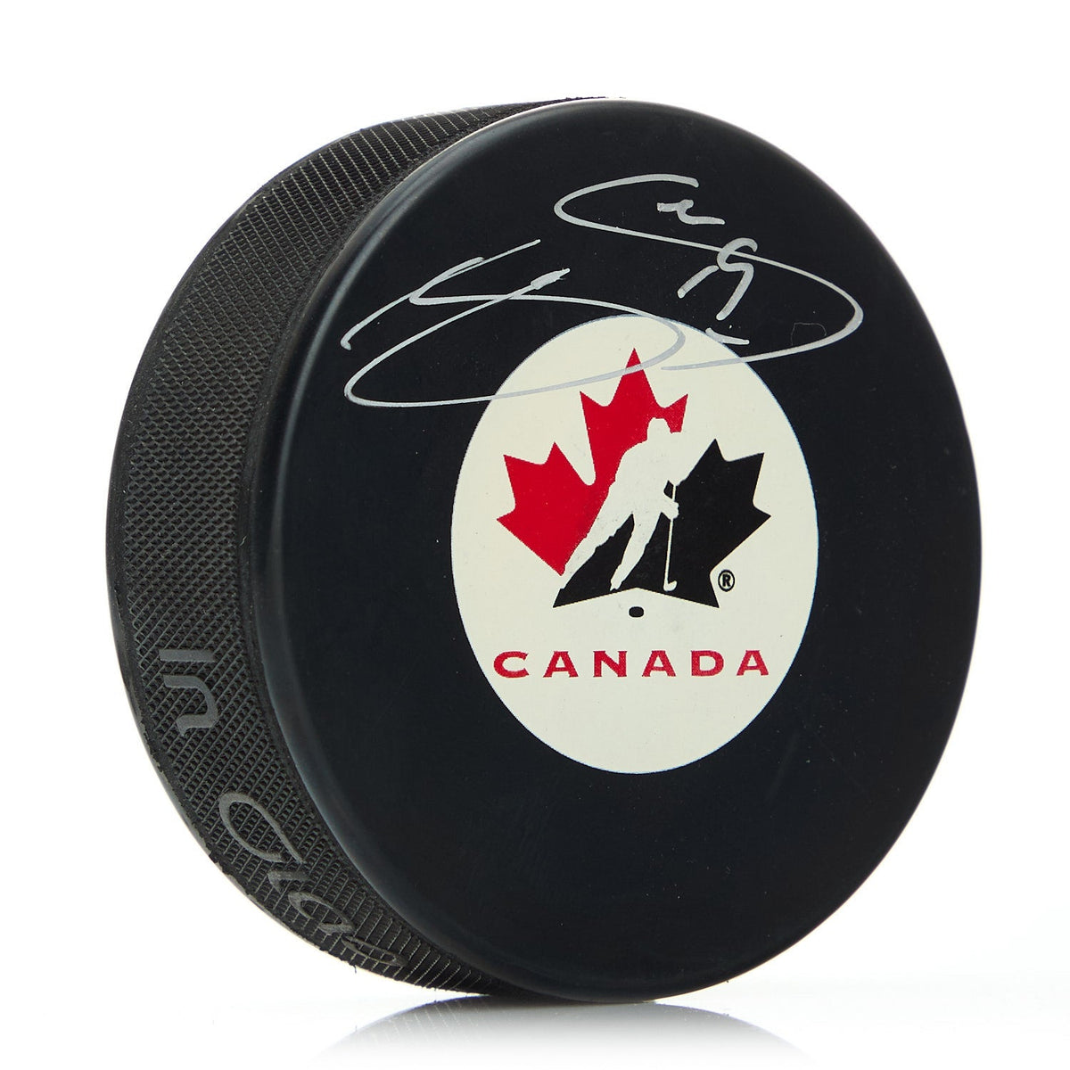 Joe Sakic Autographed Team Canada Primary Logo Hockey Puck product image 1, provided for visual reference and product detail
