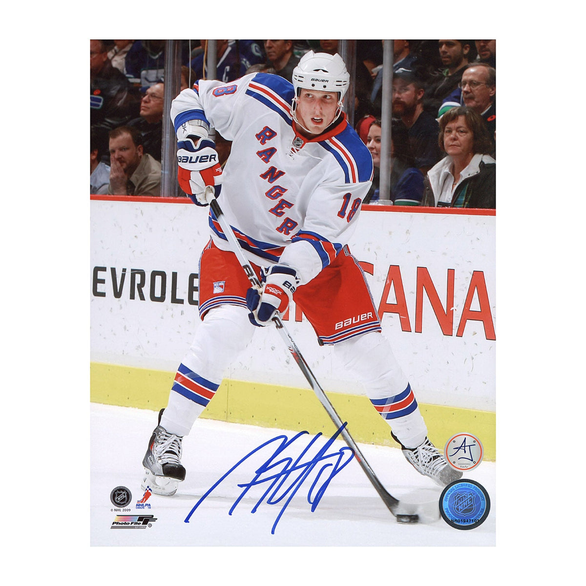 Marc Staal Autographed New York Rangers Puck Rush 8x10 Photo product image 1, provided for visual reference and product