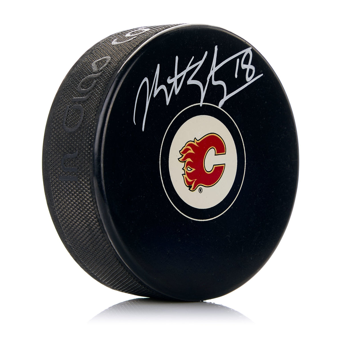 Matt Stajan Calgary Flames Autographed Hockey Puck product image 1, provided for visual reference and product detail review