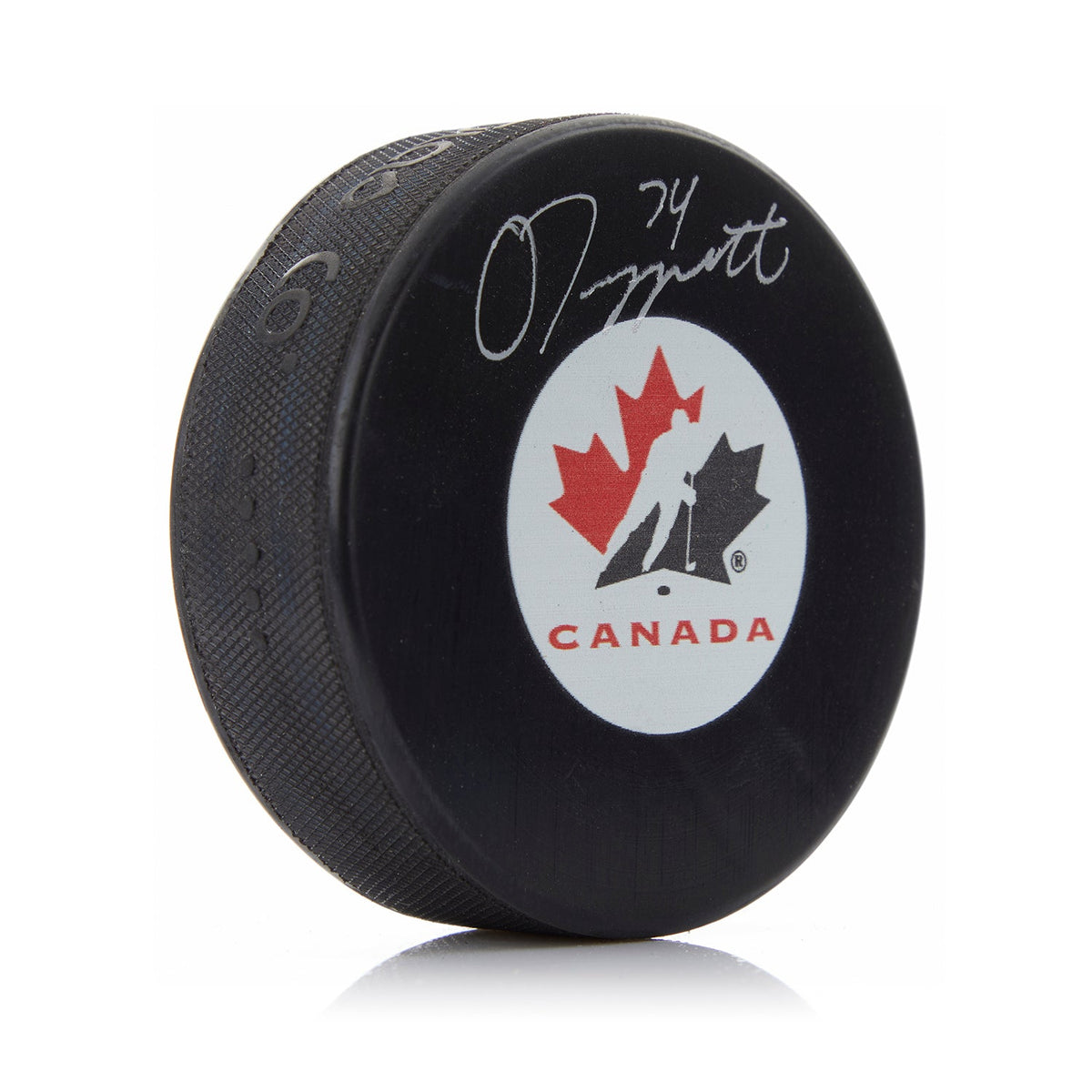 Owen Tippett Autographed Team Canada Hockey Puck product image 1, provided for visual reference and product detail review