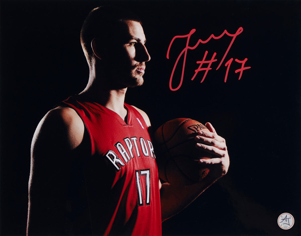Jonas Valanciunas Signed Toronto Raptors Dark Pose 11x14 Photo product image 1, provided for visual reference and product